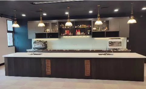 A bartending classroom for students to develop the beverage preparation skills required in the industry. A bartending classroom for students, fully equipped with tools for preparing drinks, cocktails, and coffee.